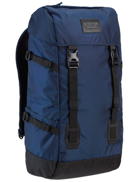 A navy blue Burton rucksack backpack on a white background