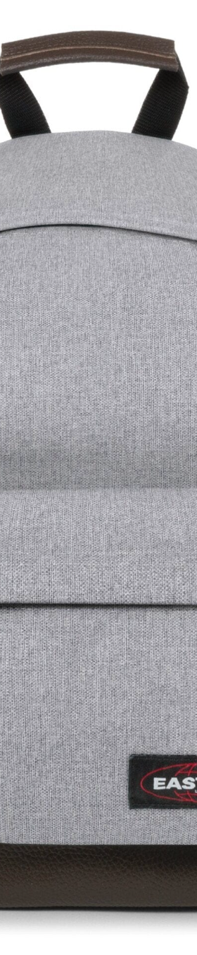 A grey Eastpak backpack on a white background