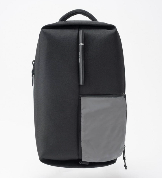 A futuristic looking black bag designed by Cote & Ciel on a white background