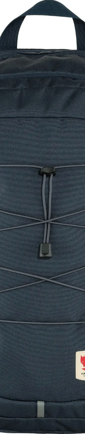 A navy blue Fjallraven backpack with a red logo on white background
