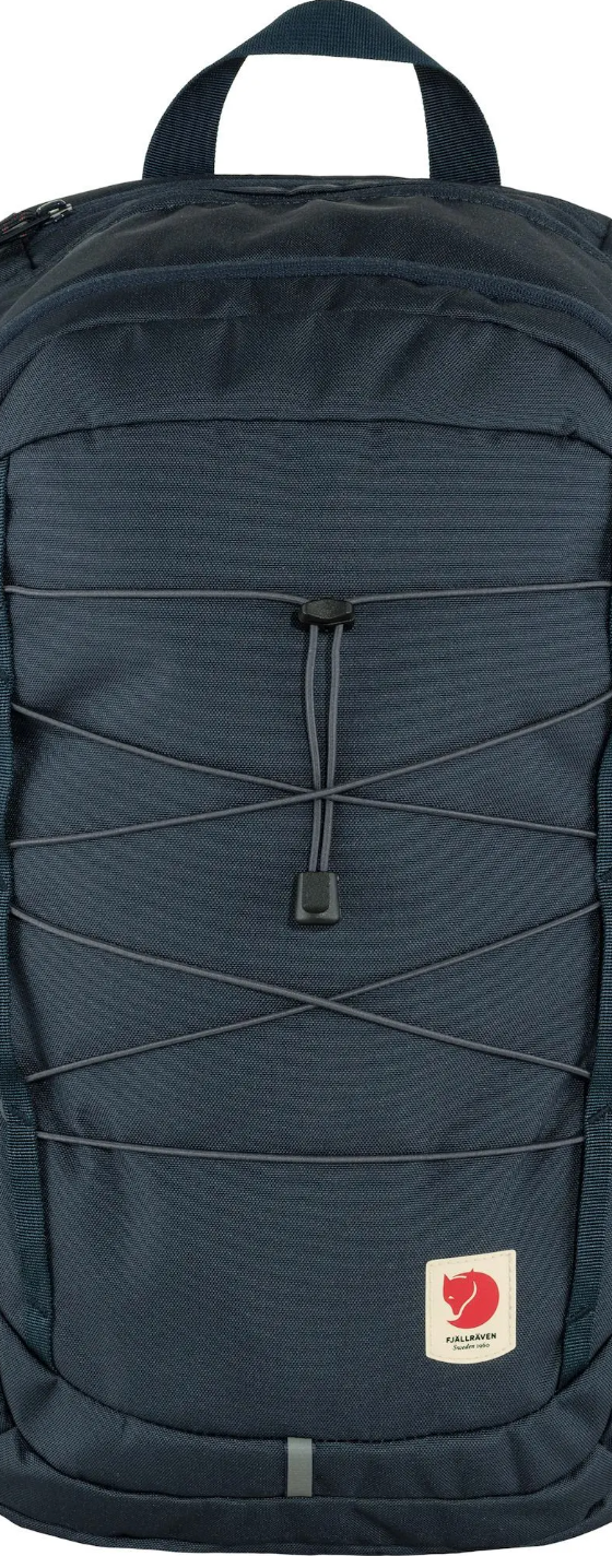 A navy blue Fjallraven backpack with a red logo on white background