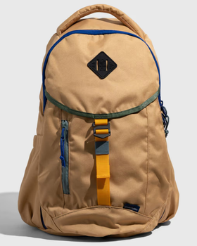 A beige United By Blue backpack with dark blue features on a white background