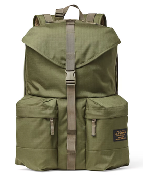 A army green Filson rucksack backpack on a white background