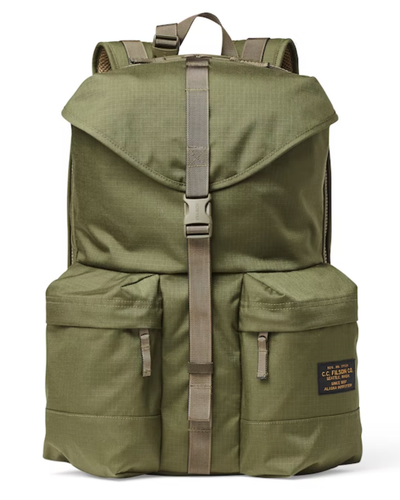 A army green Filson rucksack backpack on a white background