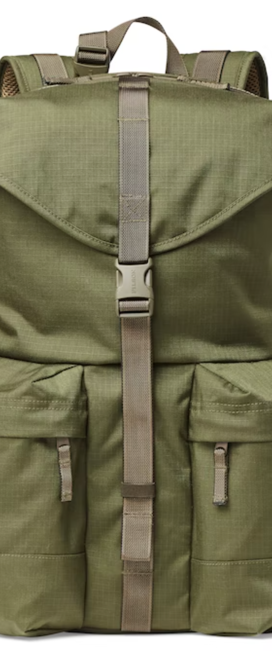 A army green Filson rucksack backpack on a white background