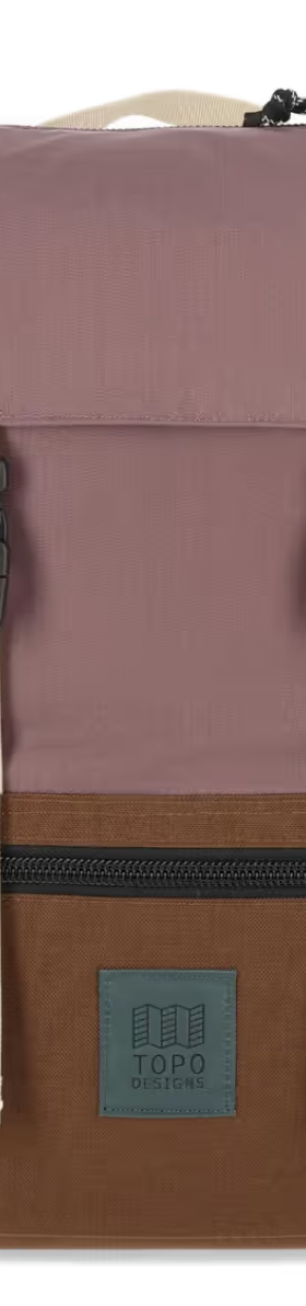 A brown and light purple rucksack backpack from Topo Designs on a white background