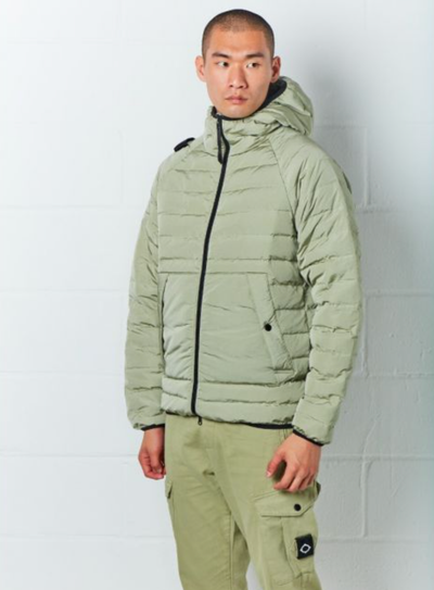 A man wearing a mint green MA.Strum technical jacket and matching pants