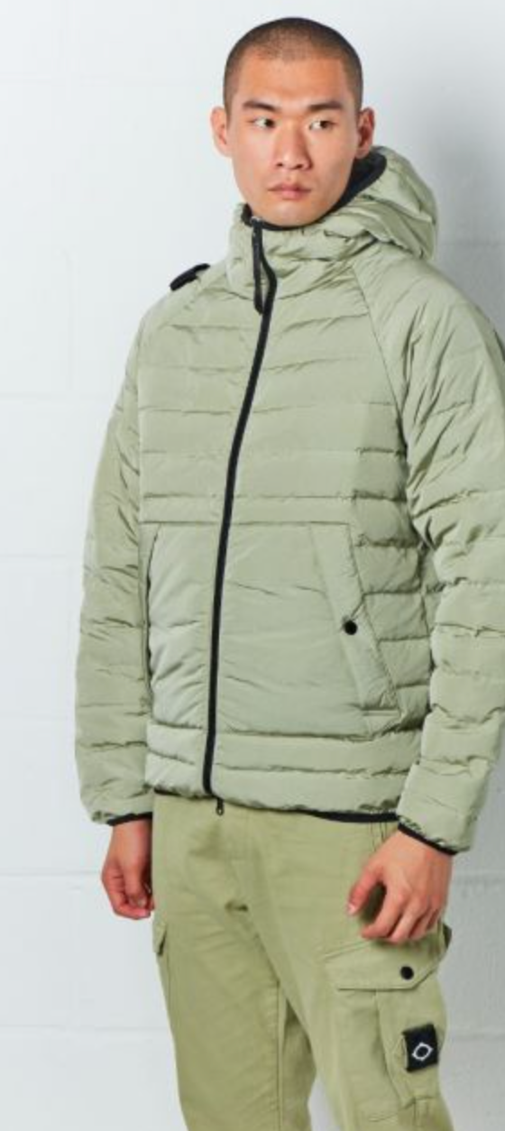A man wearing a mint green MA.Strum technical jacket and matching pants