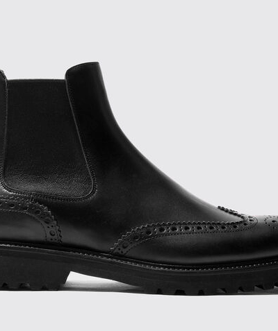 A black pair of high-end Scarosso slip-on boots