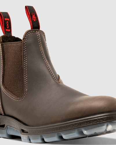 A pair of brown Redback slip-on workboots