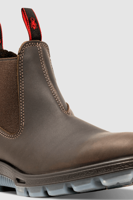A pair of brown Redback slip-on workboots