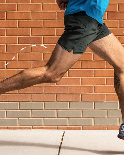 A man running in Brooks sneakers