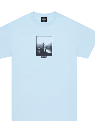 A baby blue Hockey Skateboards t-shirt with a logo and minimalist print