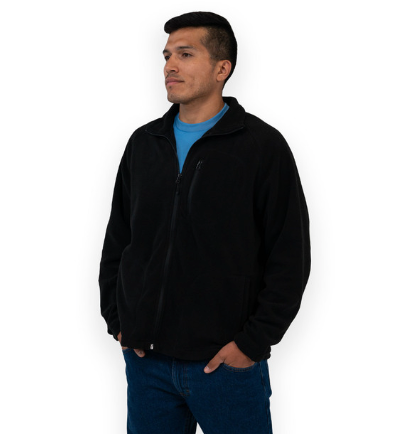 A man wearing a casual Key Apparel zip sweater with a blue shirt underneath