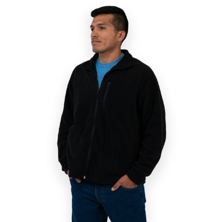A man wearing a casual Key Apparel zip sweater with a blue shirt underneath
