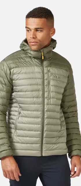 A man wearing an olive green puffy jacket by RAB