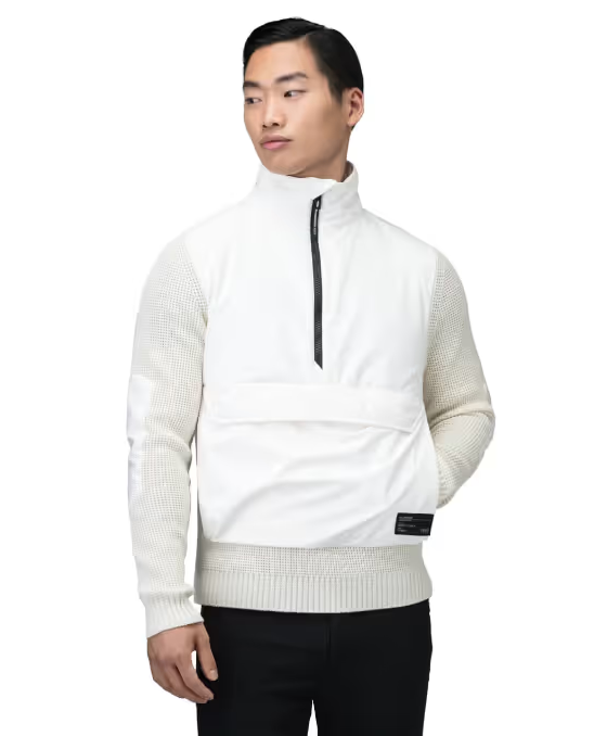 A man wearing a white futuristic Nobi jacket