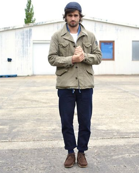 A man wearing classic brown clark shoes