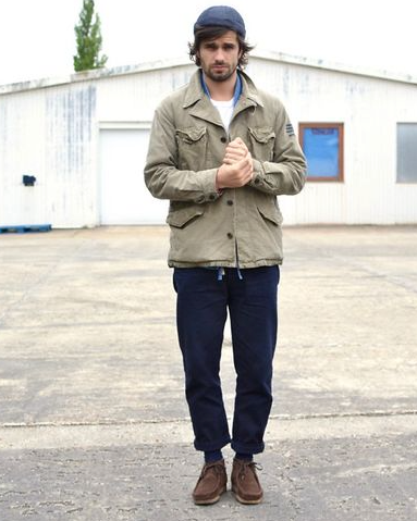 A man wearing classic brown clark shoes