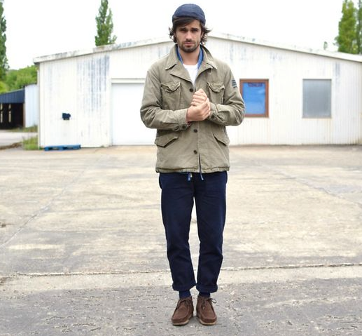 A man wearing classic brown clark shoes