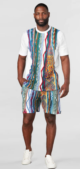 A man wearing a matching Coogi outfit with the classic design and matching shorts