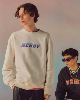 A man wearing a Nerdy branded crewneck in beige and blue