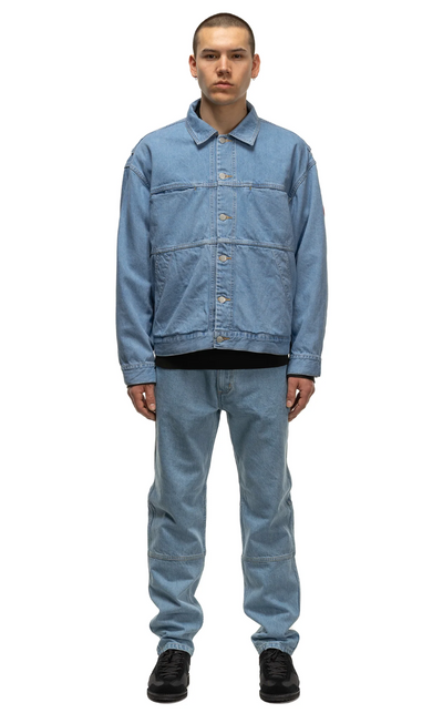 A man wearing a Cav Empt matching denim jacket and pants