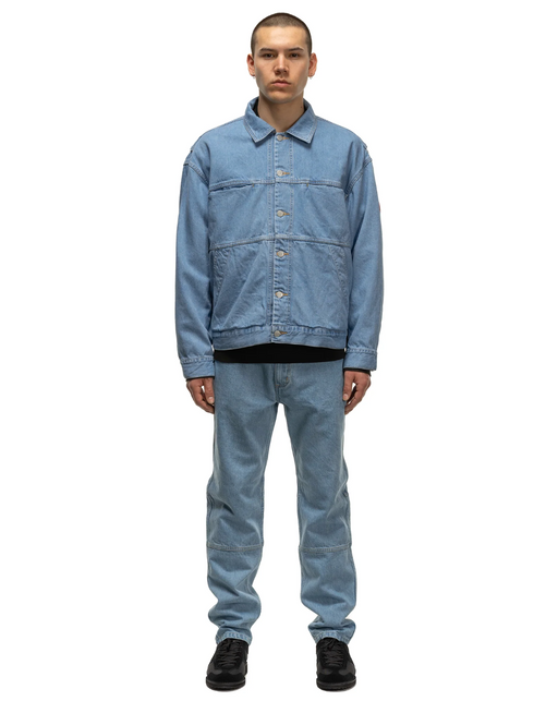 A man wearing a Cav Empt matching denim jacket and pants