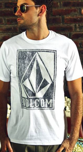 A man wearing a Volcom logo icon t-shirt in white and sunglasses