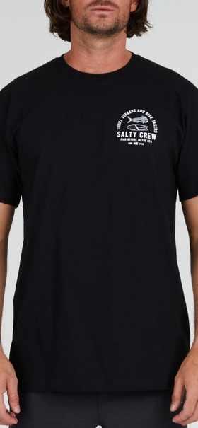 A man wearing a Salty Crew black t-shirt with a white logo on the chest