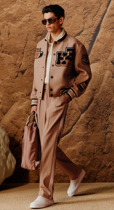 A man wearing a Hugo Boss matching brown jacket and pants