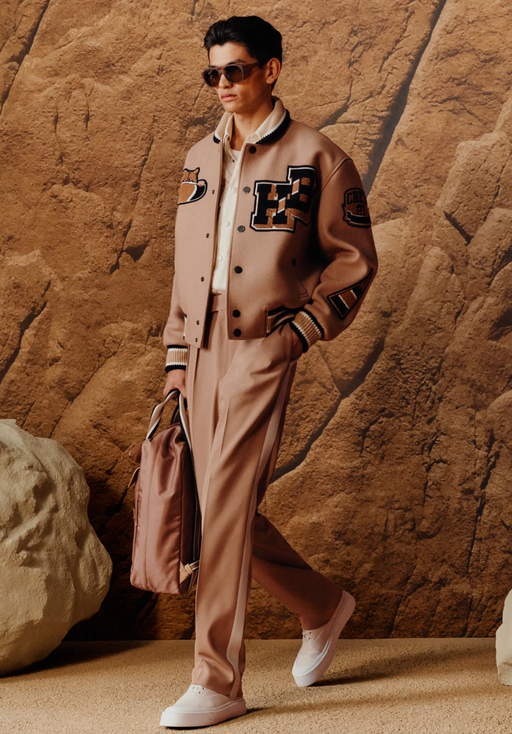 A man wearing a Hugo Boss matching brown jacket and pants