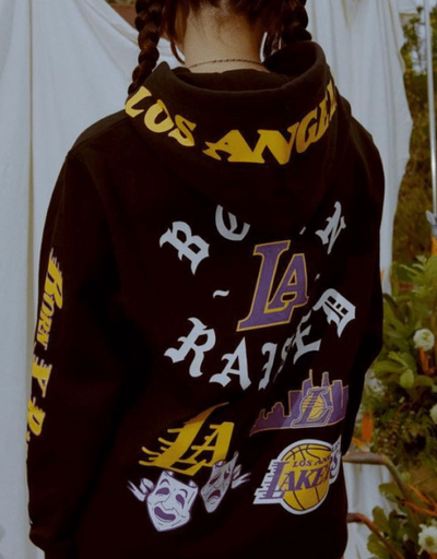 A man wearing a LA lakers Born x Raised hoodie