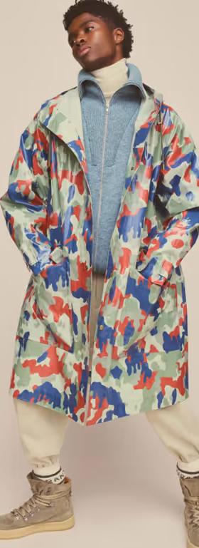 A man wearing colorful Isabel Marant jacket and cream pants