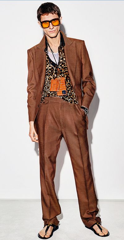 A man wearing a brown vintage-inspired Tom Ford Suit