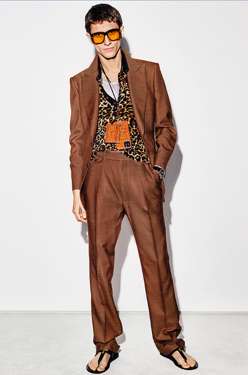 A man wearing a brown vintage-inspired Tom Ford Suit