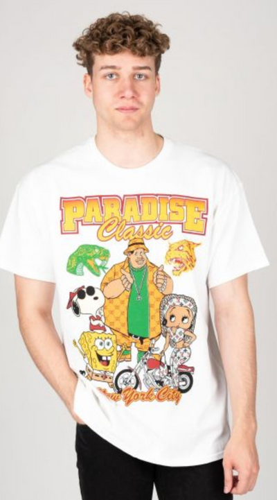 A man wearing a Paradise NYC white graphic-heavy t-shirt