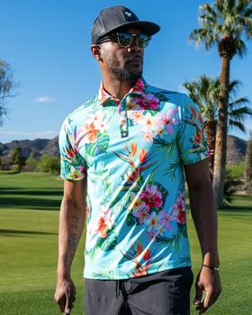 A man wearing a Bad Birdie floral golf shirt with a black hat
