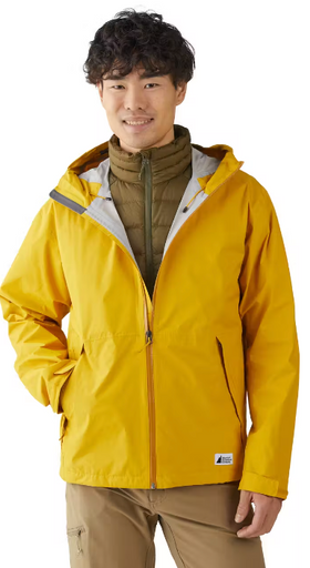 A man wearing a yellow MEC jacket and brown fleece