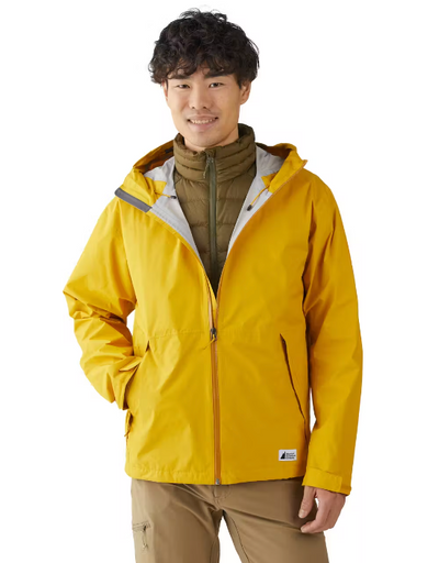 A man wearing a yellow MEC jacket and brown fleece
