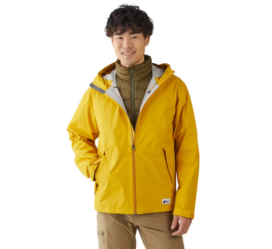 A man wearing a yellow MEC jacket and brown fleece