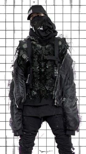 A man wearing a black 0608wear techwear outfit featuring jacket, mask and hat