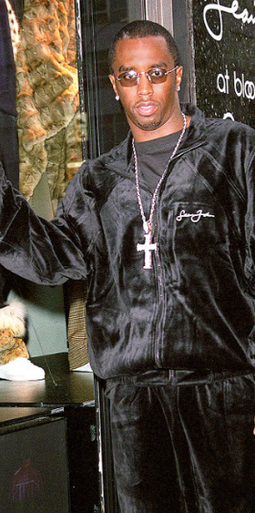 P. Diddy wearing a Sean John black tracksuit