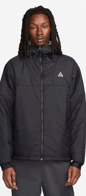 A man wearing a Nike ACG black jacket