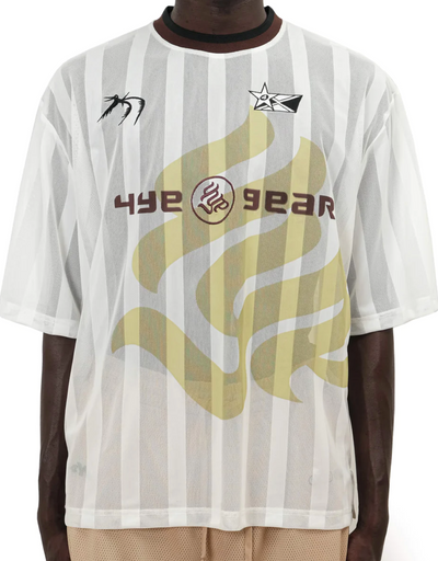A man wearing a 4YE 4Yall Entertainment striped white jersey