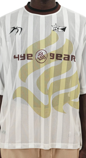 A man wearing a 4YE 4Yall Entertainment striped white jersey