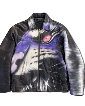 A tiger print leather jacket by Gerrit Jacob in black and purple