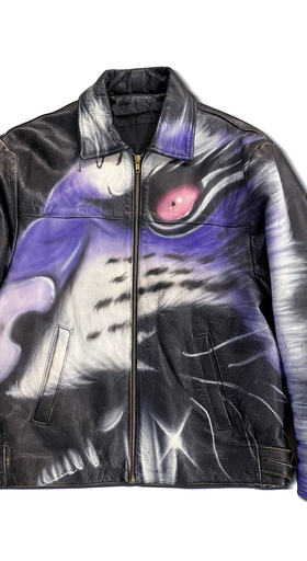 A tiger print leather jacket by Gerrit Jacob in black and purple