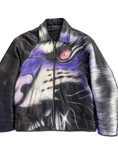 A tiger print leather jacket by Gerrit Jacob in black and purple