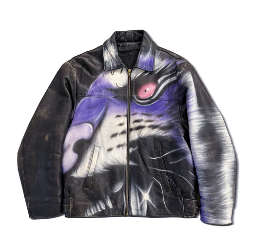 A tiger print leather jacket by Gerrit Jacob in black and purple